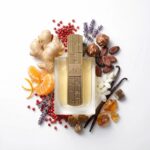 Angham Lattafa Eau de Parfum Unisex con fondo de ingredientes